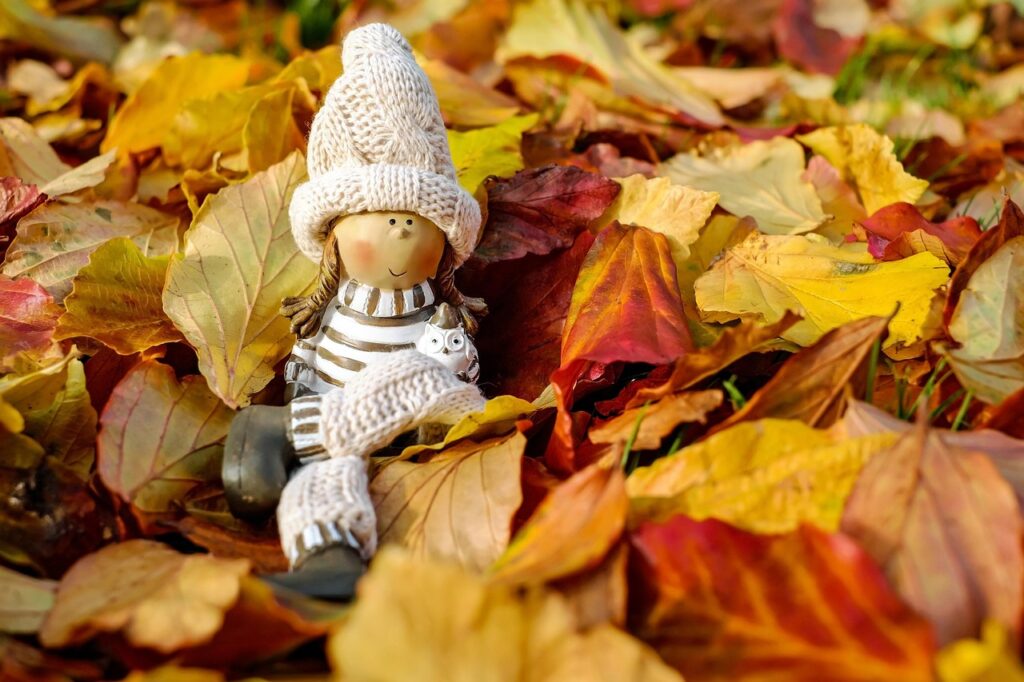doll figure, figure, girl, to sit, relax, dreams, leaves, multicoloured, fall, nature, relax, relax, fall, fall, fall, fall, fall